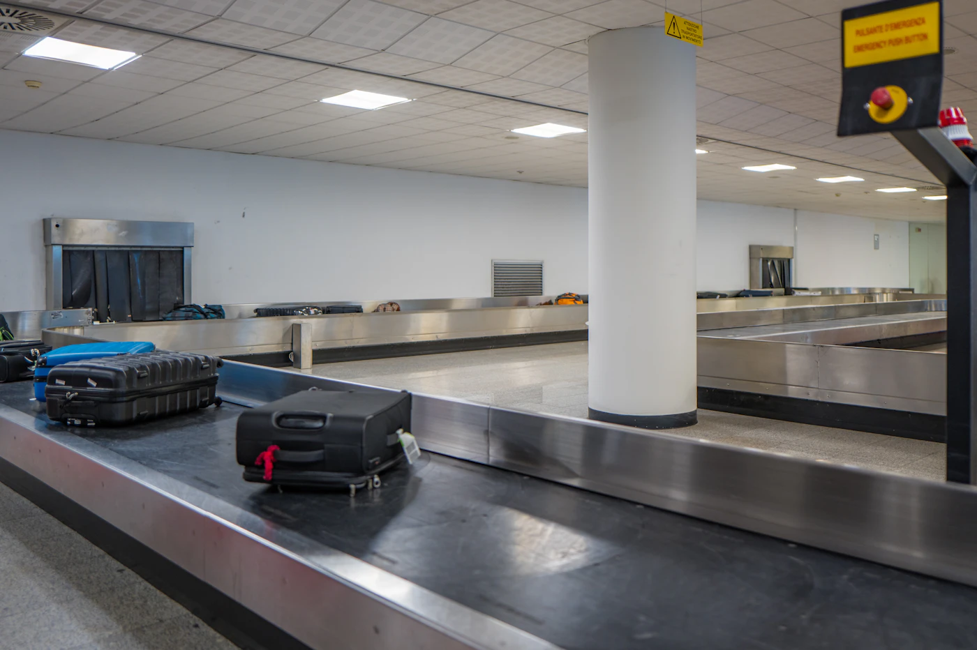 Suitcases on an airport baggage carousel