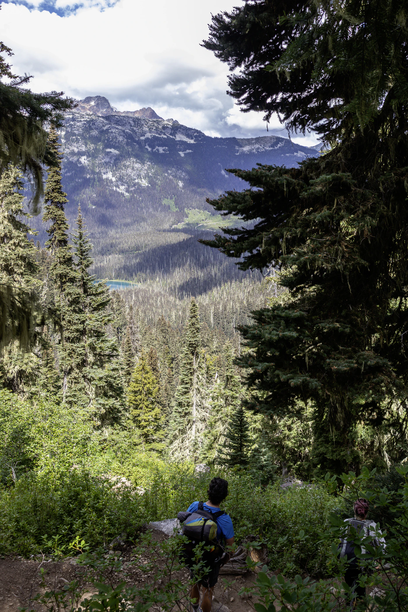 Hikers descending the Joffre Lakes trail in British Columbia